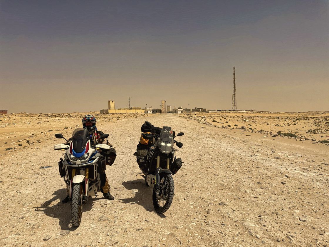 The “no man’s land” is how locals often refer to the desolate strip between Mauritania and Morocco — a disputed stretch of territory that, for years, has belonged to neither side. Beyond the roadside of this dusty track, landmines are still scattered across the desert, making it dangerous to stray even a few meters off route.