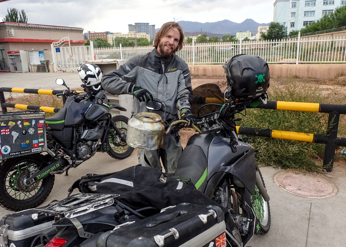 Even filling up your tank in China was a complicated act. We were not allowed to go to the pump, so we had to fill this huge tea pots to fill our motorbikes