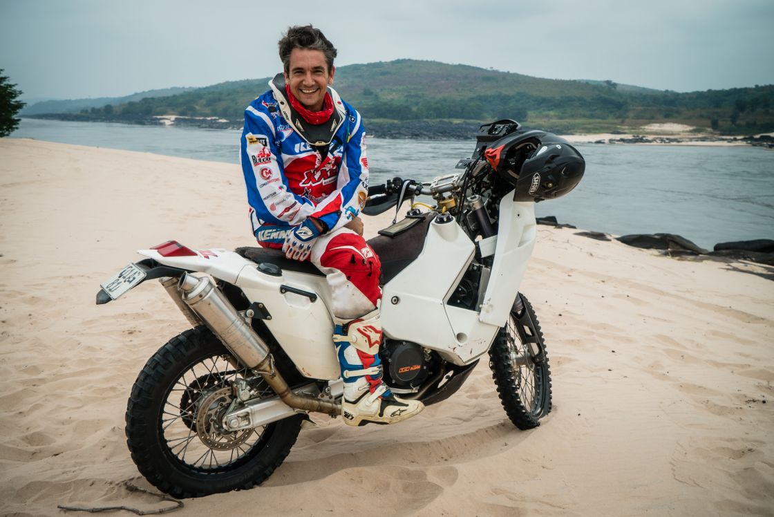 Frank and his KTM 690 Rally on the banks of the Congo River.