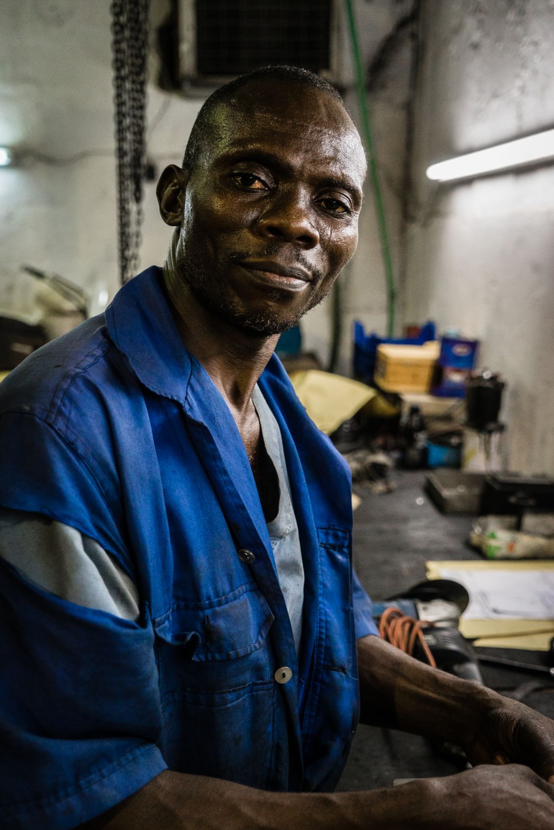Moise, a local mechanic and wizard helping us get our bikes ready for the next leg.