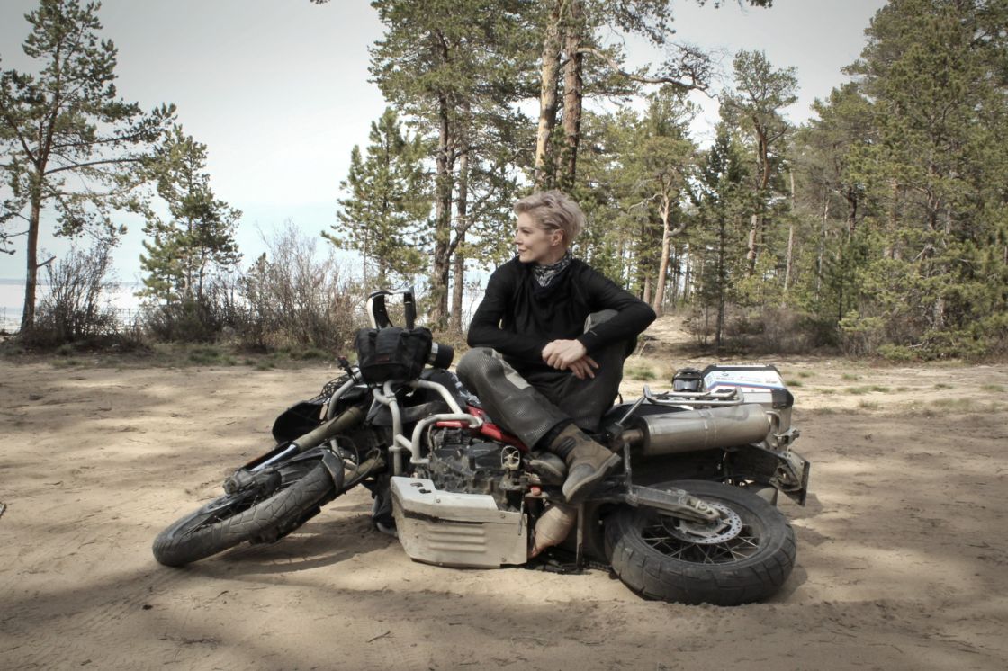 On her bike, adventure riding