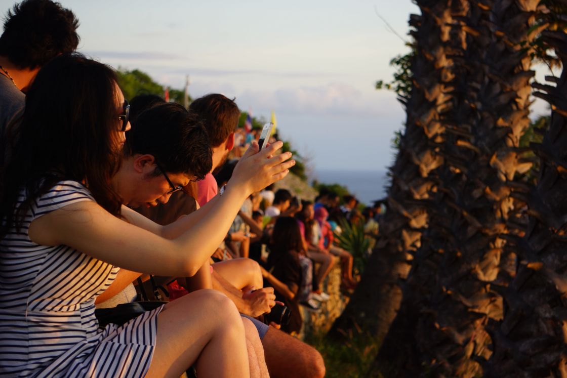 Watching the sunset in Phromthep cape, Thailand.