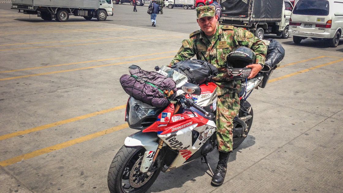 Teapot One would visit 54 countries and be sat on by countless border guards before Bruce's second trip would finish. This guard is Colombian
