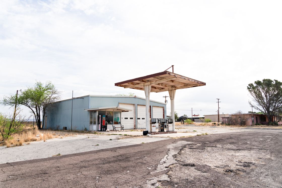 A common sight around rural Texas. Many villages had abandoned property. Sad but also beautiful in its own way.