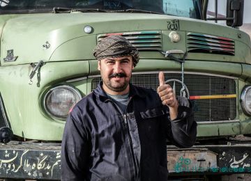 Friendly truck driver, desert, Iran