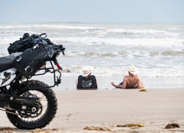 After a week of intense riding, washing your feet in the oceans is both nice and an environmental hazard.