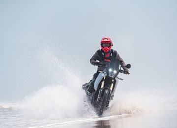 Riding on the beach feels off, but oh, so fun! Robert Baldinger doing his best Baywatch impression.